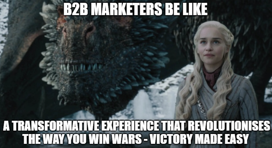 Daenerys Targaryen of Game of Thrones looking at the sky, smiling, her dragon right next to her
